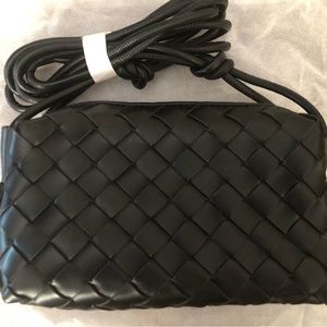 Never used black purse - a great version of mini loop camera bag